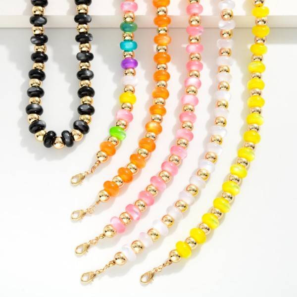Candy Bead Beaded Necklace Featuring Gold Tone Beads 

- Approximately 16" L 
- Extender 3" L 