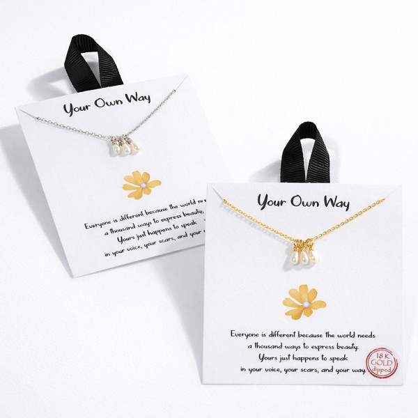 Dainty Chain Link Necklace Featuring Freshwater Pearl Charms 					
					
- Approximately 16" L					
- Extender 2" L					
- Hypoallergenic Brass Base					
- 18K Gold Dipped					
- Card: "Everyone is different because the world needs a thousand ways to express beauty. Yours just happens to speak in your voice, your scars, and your way."					