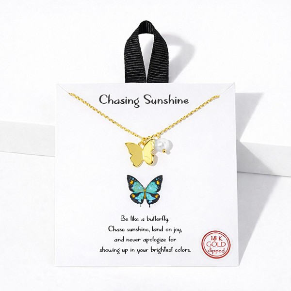 Dainty Chain Link Necklace Featuring Metal Tone Butterfly Pendant With Pearl  Accent																							
																									
- Approximately 16" L																									
- Extender 2" L																									
- Hypoallergenic Brass Base																									
- 18K Gold Dipped																									
- Card: "Be like a butterfly. Chase sunshine, land on joy, and never apologize for showing up in your brightest colors."																									