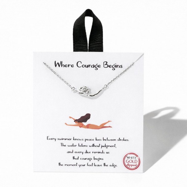 Dainty Chain Link Necklace Featuring Metal Tone Swimmer Pendant 					
					
- Approximately 16" L					
- Extender 2" L					
- Hypoallergenic Brass Base					
- 18K Gold Dipped					
- Card: " Every swimmer knows peace lives between strokes. The water listens without judgment, and every dive reminds us that courage begins that moment your feet leave the edge."					