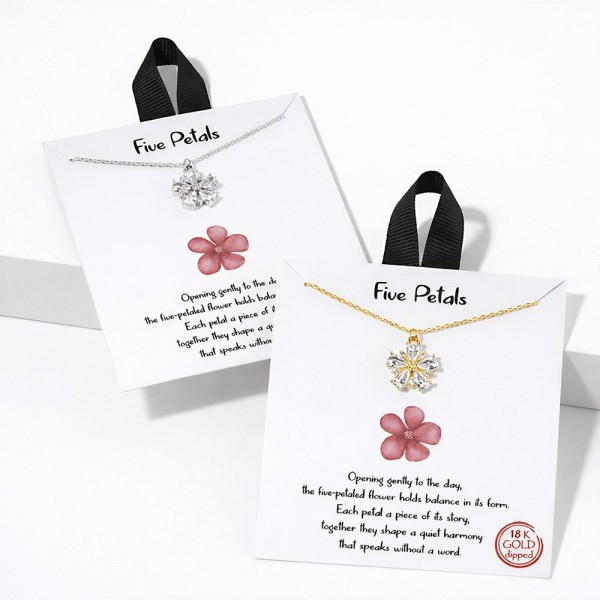 Dainty Chain Link Necklace Featuring Cubic Zirconia Flower Pendant 			
					
- Approximately 16" L					
- Extender 2" L					
- Hypoallergenic Brass Base					
- 18K Gold Dipped					
- Card: "Opening gently to the day, the five-petaled flower holds balance in its form. Each petal a piece of its story, together they shape a quiet harmony that speaks without a word."					