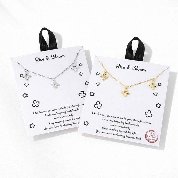 Dainty Chain Link Necklace Featuring Metal Tone Flower & Cubic Zirconia Charms 				
					
- Approximately 16" L					
- Extender 2" L					
- Hypoallergenic Brass Base					
- 18K Gold Dipped					
- Card: "Like flowers, you were made to grow through seasons. Each new beginning holds beauty, even in uncertainty. Keep reaching toward the light. You are closer to blooming than you think."					