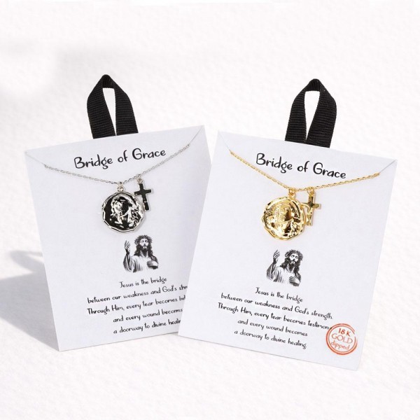 Dainty Chain Link Necklace Featuring Metal Tone Jesus Medallion & Cross Pendants 			
					
- Approximately 16" L					
- Extender 2" L					
- Hypoallergenic Brass Base					
- 18K Gold Dipped					
- Card: "Jesus is the bridge between our weakness and God's strength. Through Him, every tear becomes testimony, and every wound becomes a doorway to divine healing."					
					