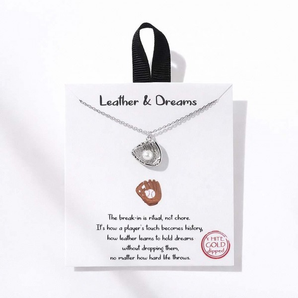 Dainty Chain Link Necklace Featuring Metal Tone Baseball Glove & Pearl Pendant 				
					
- Approximately 16" L					
- Extender 2" L					
- Hypoallergenic Brass Base					
- 18K Gold Dipped					
- Card: "The break-in is ritual, not chore. It's how a player's touch becomes history, how leather learns to hold dreams without dropping them, no matter how hard life throws."					