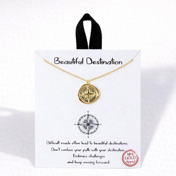 Dainty Chain Link Necklace Featuring Metal Tone Compass Pendant 				
					
- Approximately 16" L					
- Extender 2" L					
- Hypoallergenic Brass Base					
- 18K Gold Dipped					
- Card: "Difficult roads often lead to beautiful destinations. Don't confuse your path with your destination. Embrace challenges and keep moving forward."					
