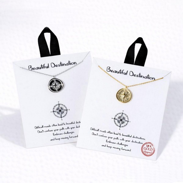 Dainty Chain Link Necklace Featuring Metal Tone Compass Pendant 				
					
- Approximately 16" L					
- Extender 2" L					
- Hypoallergenic Brass Base					
- 18K Gold Dipped					
- Card: "Difficult roads often lead to beautiful destinations. Don't confuse your path with your destination. Embrace challenges and keep moving forward."					