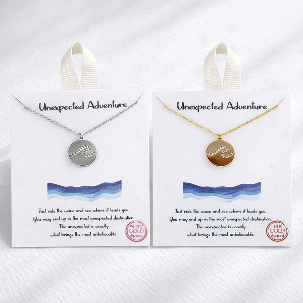 Dainty Chain Link Necklace Featuring Metal Tone Circle Wave Pendant 					
					
- Approximately 16" L					
- Extender 2" L					
- Hypoallergenic Brass Base					
- 18K Gold Dipped					
- Card: "Just ride the wave and see where it leads you. You may end up in the most unexpected destination. The unexpected is usually what brings the most unbelievable." 					
