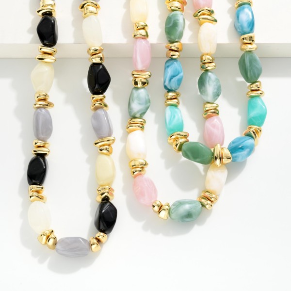 Chunky Acetate Stone Beaded Necklace With Gold Details 

- Approximately 14" L
- Extender 2" L