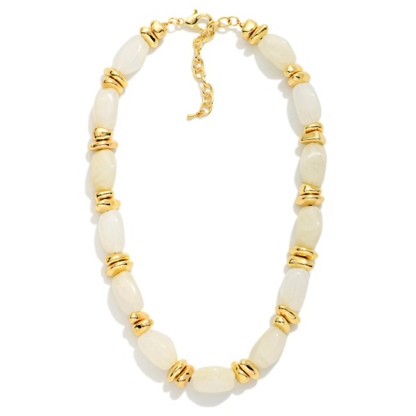 Chunky Acetate Stone Beaded Necklace With Gold Details 

- Approximately 14" L
- Extender 2" L
