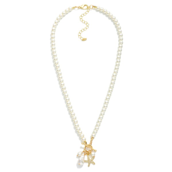 Pearl Beaded Necklace Featuring Starfish, Baroque Pearl, & Toggle Clasp

- Approximately 16" L
- Extender 3" L
