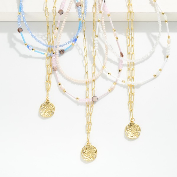 Layered Chain Link & Beaded Necklace Featuring Hammered Metal Pearl Medallion Pendant 

- Approximately 14" L
- Extender 3" L