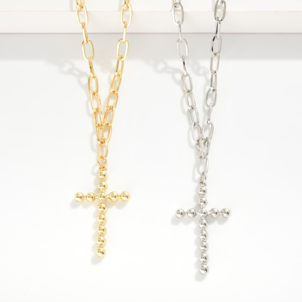 Paperclip Chain Necklace Featuring Metal Tone Bubble Cross Pendant 

- Gold Dipped 
- Approximately 16" L
- Extender 3" L
