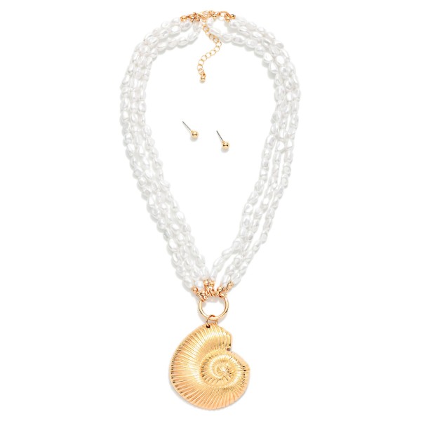 Layered Pearl Beaded Necklace Featuring Metal Tone Fossil Pendant 

- Gold Ball Studs Included 
- Approximately 18" L
- Extender 3" L