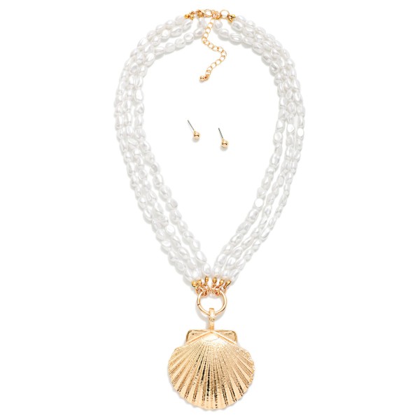 Layered Pearl Beaded Necklace Featuring Metal Tone Shell Pendant 

- Gold Ball Studs Included 
- Approximately 18" L
- Extender 3" L