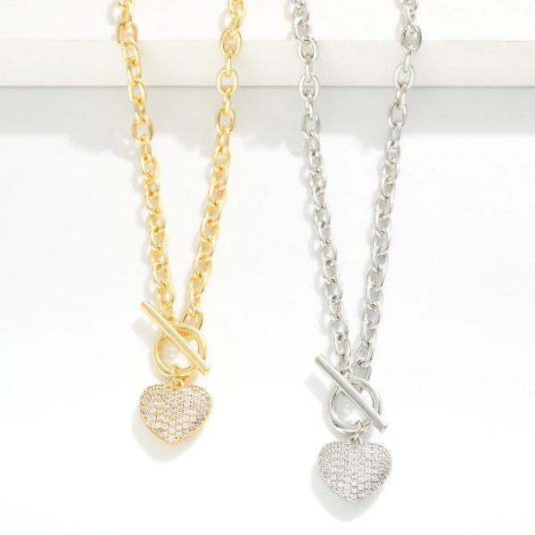 Chain Link Necklace Featuring Cubic Zirconia Pave Heart Pendant & Toggle Clasp 

- Gold Dipped
- Approximately 18" L
- Extender 1" L
