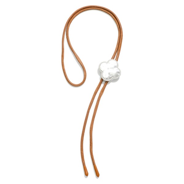 Leather Bolo Necklace Featuring Hammered Metal Clover Pendant

- Adjust To The Length Of Your Choosing
- Approximately 36" L

