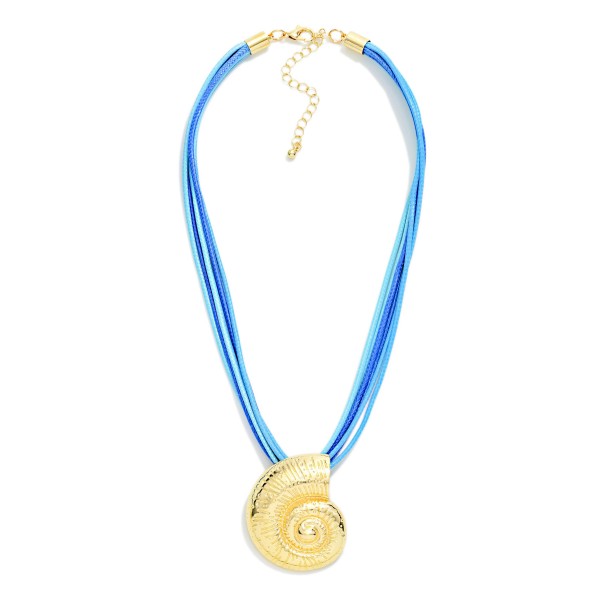 Layered Wax Cord Necklace Featuring Metal Tone Fossil Pendant 

- Approximately 16" L
- Extender 3" L