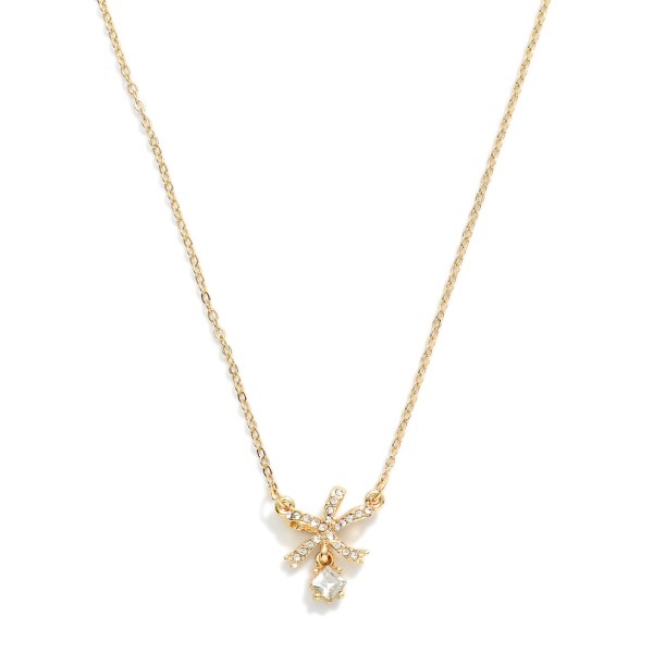 Dainty Chain Link Necklace Featuring Cubic Zirconia & Metal Tone Bow Pendant

- Approximately 15.5" L
- Extender 2" L

