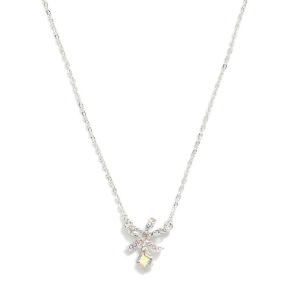 Dainty Chain Link Necklace Featuring Cubic Zirconia & Metal Tone Bow Pendant

- Approximately 15.5" L
- Extender 2" L

