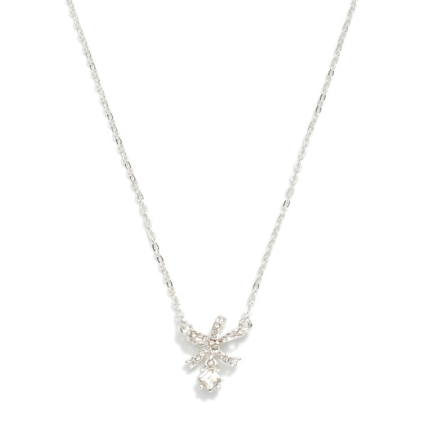 Dainty Chain Link Necklace Featuring Cubic Zirconia & Metal Tone Bow Pendant

- Approximately 15.5" L
- Extender 2" L

