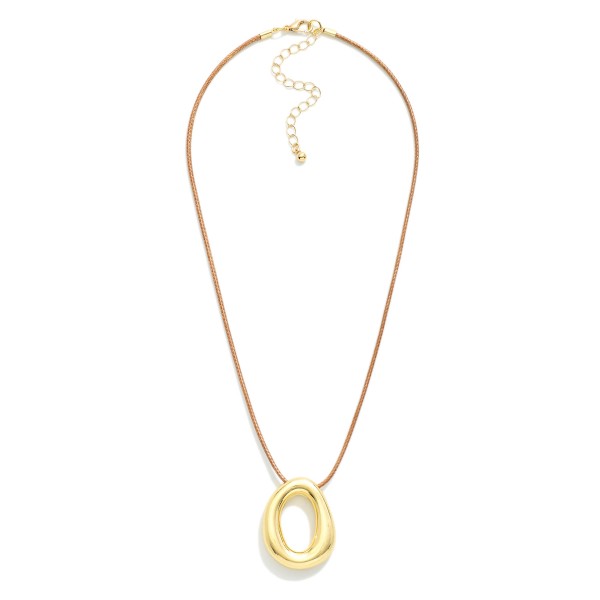 Vegan Leather Necklace Featuring Gold Tone Puffy O Pendant

- Approximately 18.5" L
- Extender 2" L

