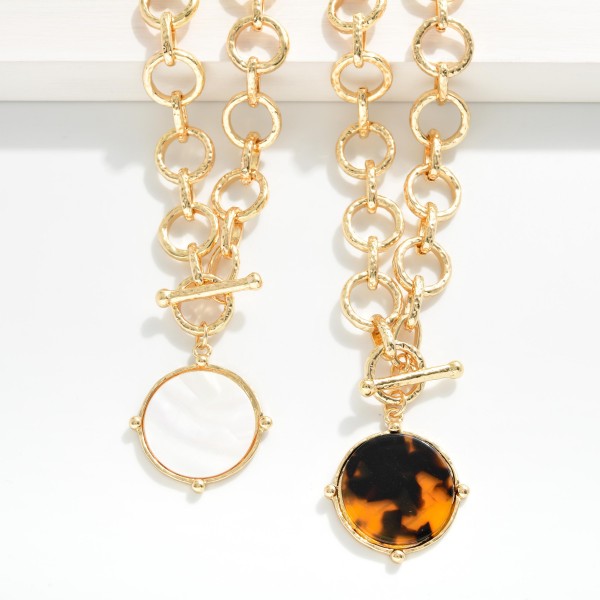 Hammered Metal Circle Link Chain Link Necklace Featuring Acetate Circle & Toggle Clasp Pendant

- Approximately 16" L 