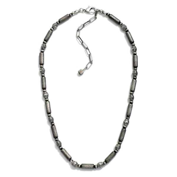 Brushed Metal Cylinder & Engraved Geometric Shape Bead Beaded Necklace 

- Approximately 14" L
- Extender 3" L