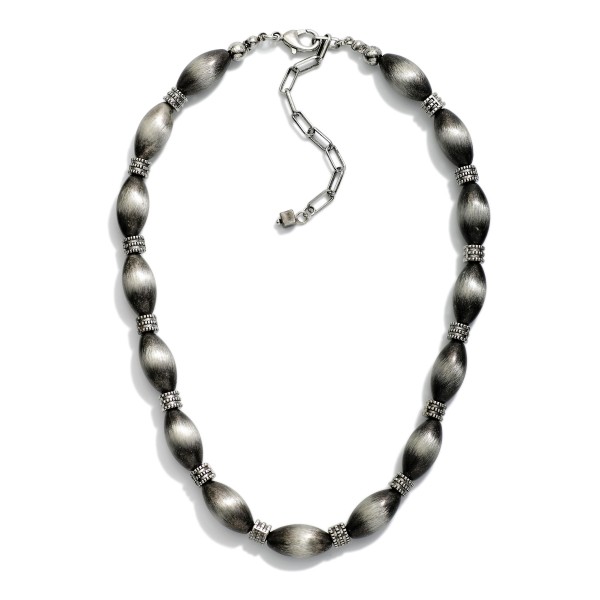 Brushed Metal Cylinder & Textured Metal Bead Beaded Necklace 

- Approximately 14" L
- Extender 3" L