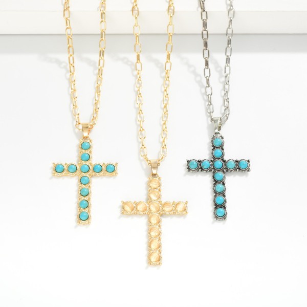 Chain Link Necklace Featuring Stone Studded Cross Pendant 

- Approximately 14" L
- Extender 3" L
