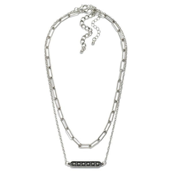 Layered Chain Link Necklace Featuring Metal Bar Pendant With Flower Details 

- Approximately 14" L
- Extender 3" L