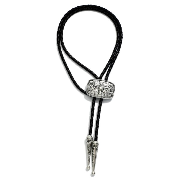 Braided Leather Bolo Necklace Featuring Engraved Concho With Steer Detail  

- Approximately 18" L