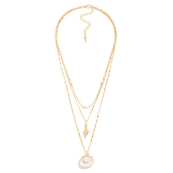 Layered Multi Chain Necklace Featuring Shell Pendants And Pearls 

- Approximately 20" L 
- Extender 3" L 