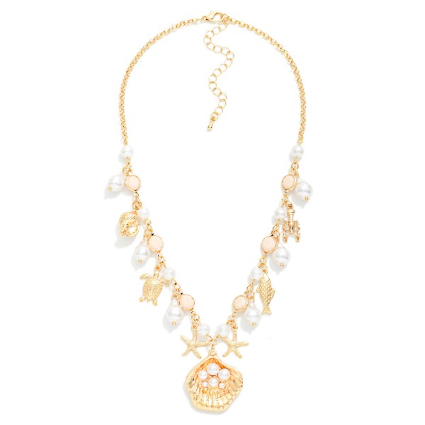 Chain Link Charm Necklace Featuring Pearls & Metal Tone Beach Charms 

- Approximately 16" L
- Extender 3" L 