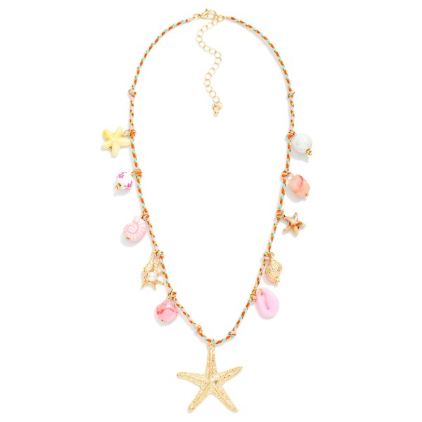 Braided Yarn & Tinsel Charm Necklace Featuring Porcelain & Metal Tone Beach Charms 

- Approximately 16" L
- Extender 3" L 