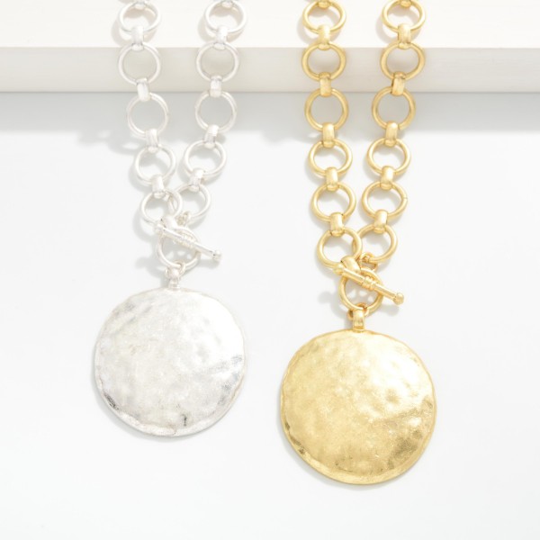 Circle Link Necklace Featuring Hammered Metal Circle Pendant & Toggle Clasp 

- Approximately 16" L 
