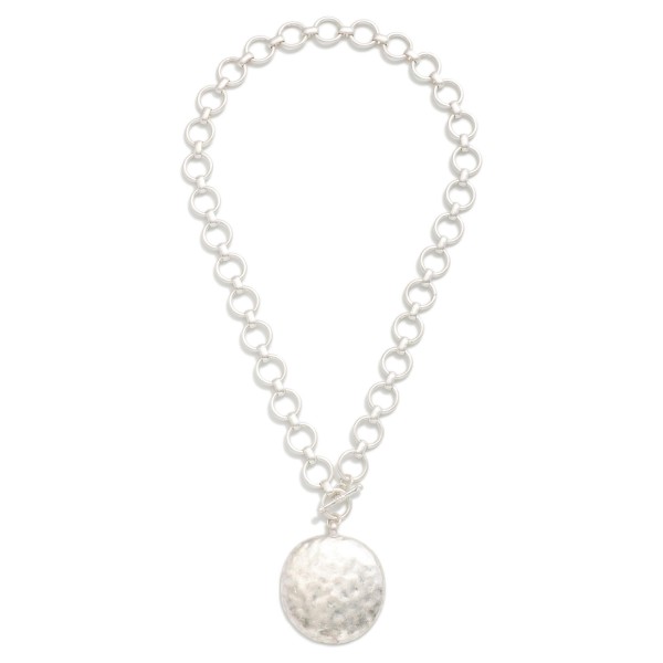 Circle Link Necklace Featuring Hammered Metal Circle Pendant & Toggle Clasp 

- Approximately 16" L 