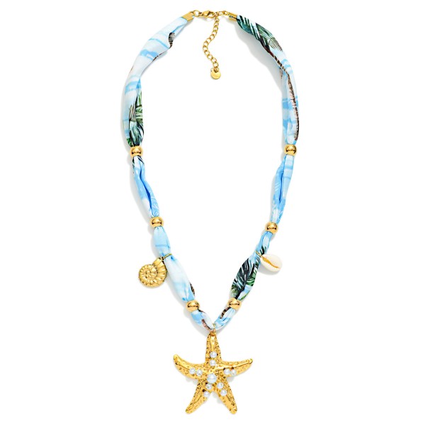 Do Everything In Love Scarf Necklace Featuring Shell Charms & Metal Tone Starfish 

- Approximately 14" L
- Extender 3" L
