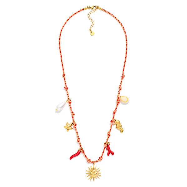 Do Everything In Love Rope & Tinsel Necklace Featuring Beach Charms, Pearl, & Metal Tone Sun 

- Approximately 14" L
- Extender 3" L