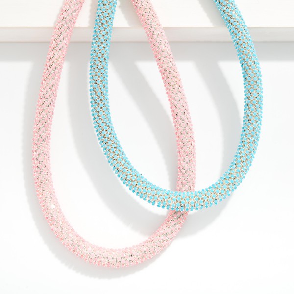 Studded Spring Stretch Necklace 

- Approximately 12" L
- Extender 2" L