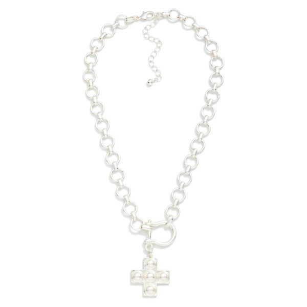 Circle Link Chain Link Necklace Necklace With Horsebit & Metal Tone Studded Plus Cross Pendant 

- Approximately 16" L
- Extender 3" L