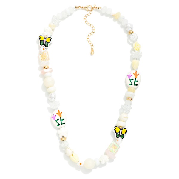 Multi Bead Beaded Necklace Featuring Flowers & Porcelain Beads

- Approximately 16" L
- Extender 3" L