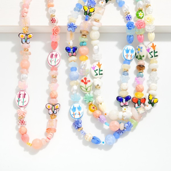 Multi Bead Beaded Necklace Featuring Flowers & Porcelain Beads

- Approximately 16" L
- Extender 3" L