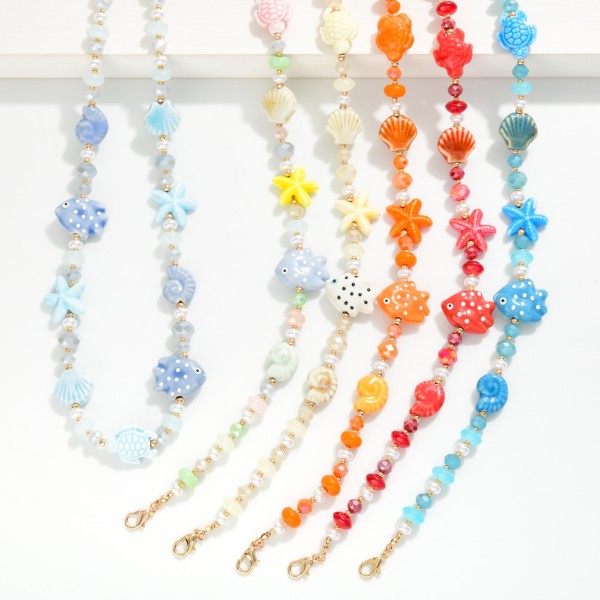 Beaded Necklace Featuring Nautical Beads & Pearls 

- Approximately 16" L
- Extender 3" L