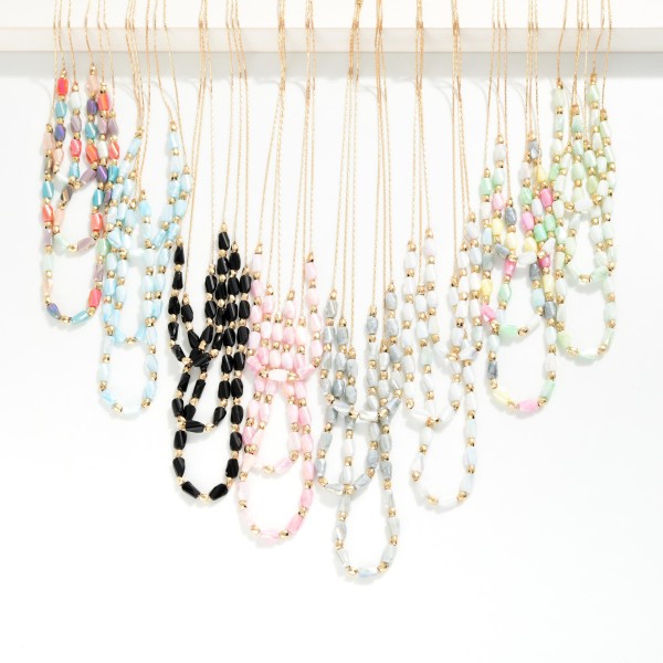 Layered Beaded Necklace Featuring Cracked Faceted Cylinder Beads

- Approximately 16" L
- Extender 3" L