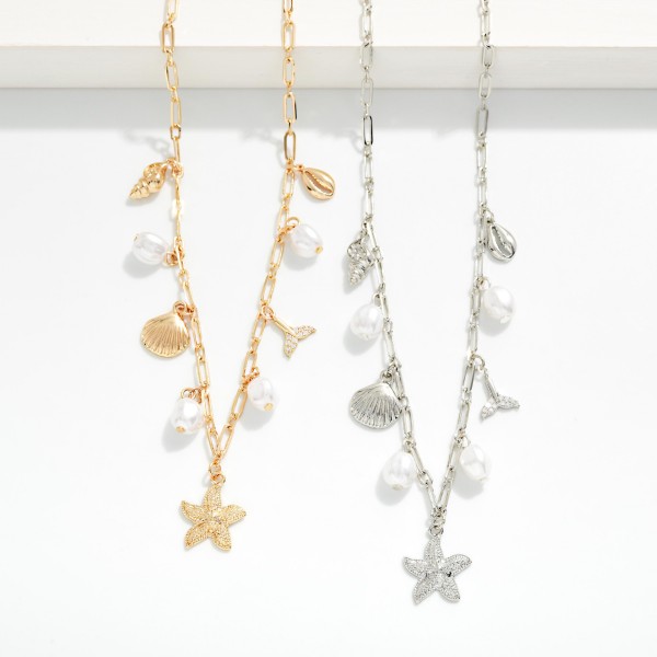 Chain Link Charm Necklace Featuring Beach & Pearl Charms 

- Approximately 14" L
- Extender 3" L