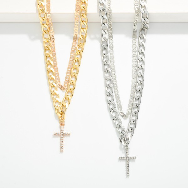 Layered Metal Tone Chain Link Necklace Featuring Cross Pendant 

- Approximately 16" L 
