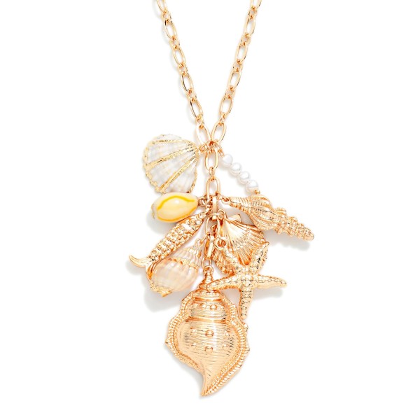Chain Link Charm Necklace Featuring Shells & Metal Tone Beach Charms 

- Approximately 24" L
- Extender 3" L