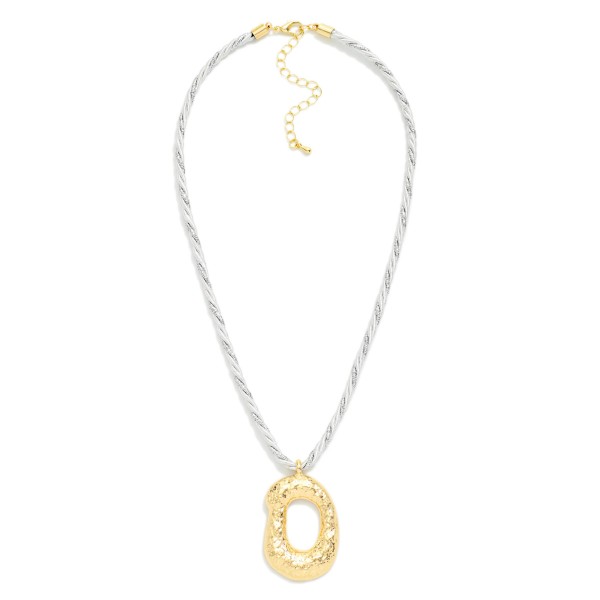 Twisted Rope Necklace Featuring Metal Tone Oval Pendant 

- Approximately 18" L 
- Extender 3" L 