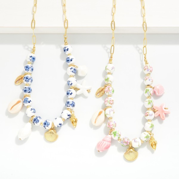 Chain Link & Chinoiserie Bead Beaded Necklace Featuring Porcelain & Metal Tone Beach Charms

- APproximately 2.5" D  