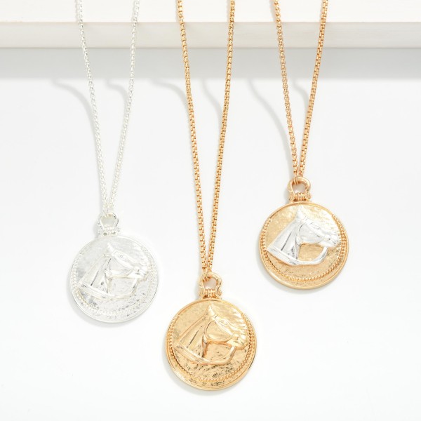 Metal Tone Box Chain Link Necklace Featuring Medallion Horse Pendant 

- Approximately 18" L 
- Extender 2" L  